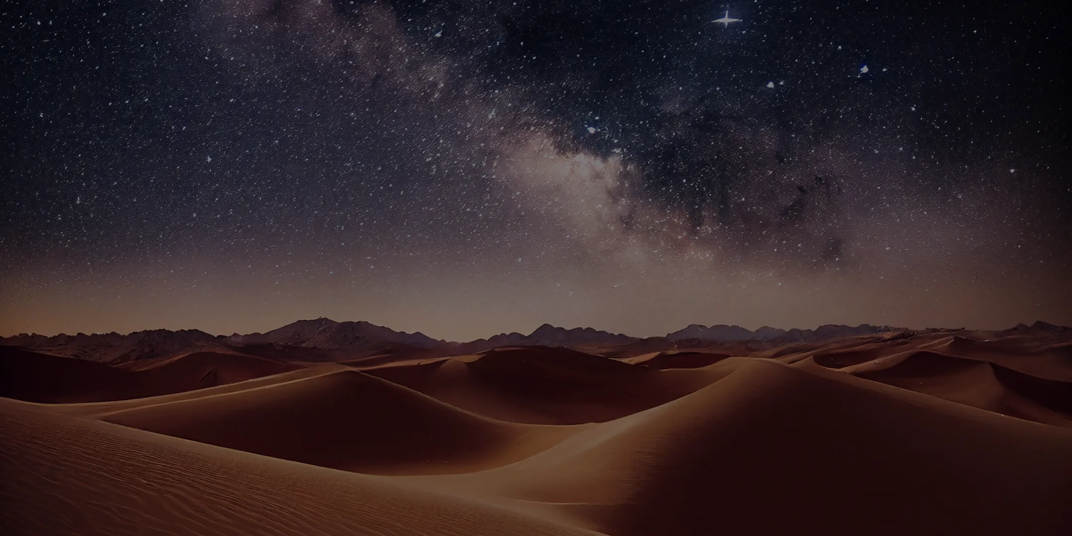 Dünenlandschaft unter Sternenhimmel
